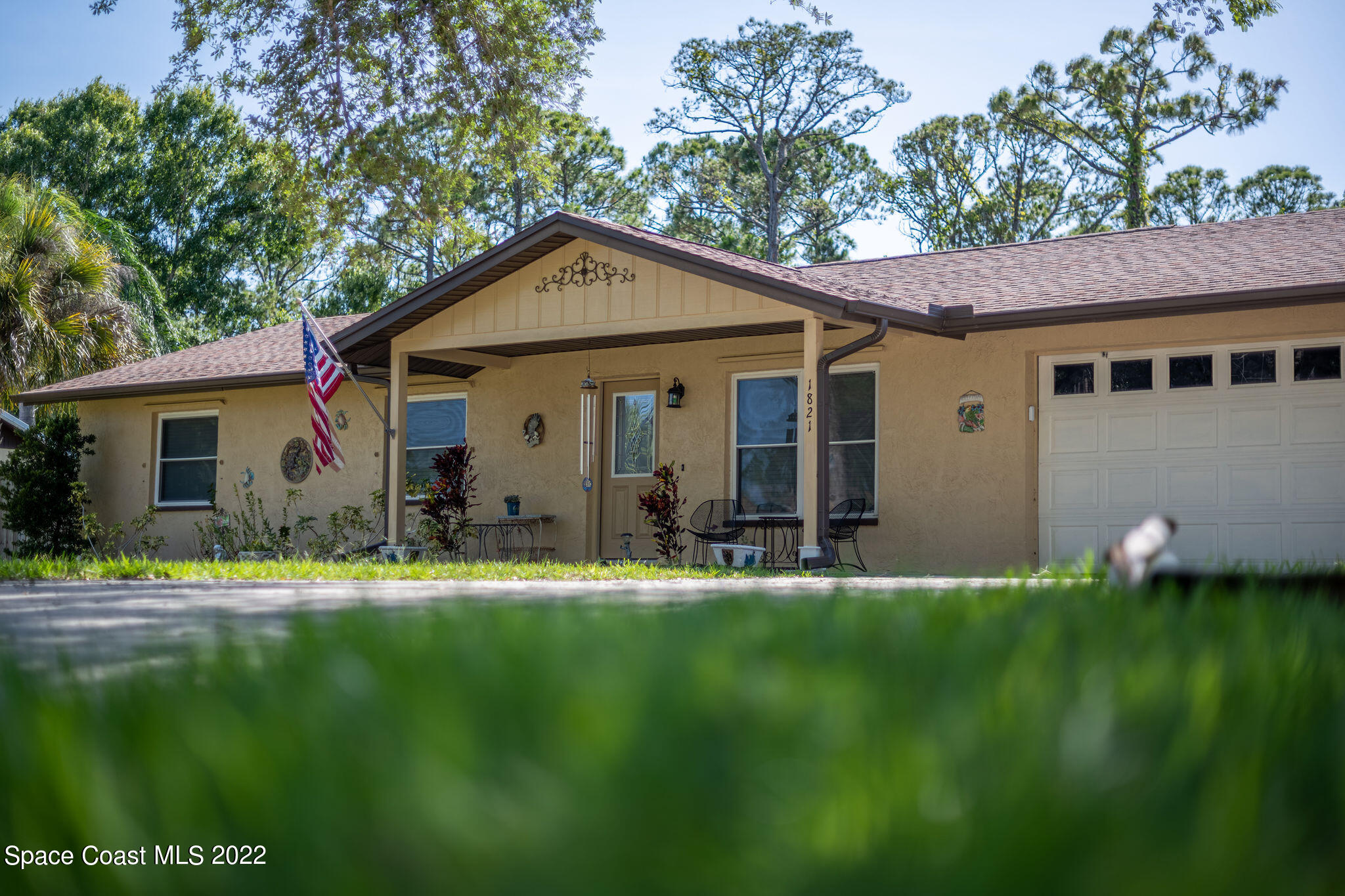 1821 Britt Road Cocoa, FL 32926 - Photo 4 of 63 a front view of a house with a yard
