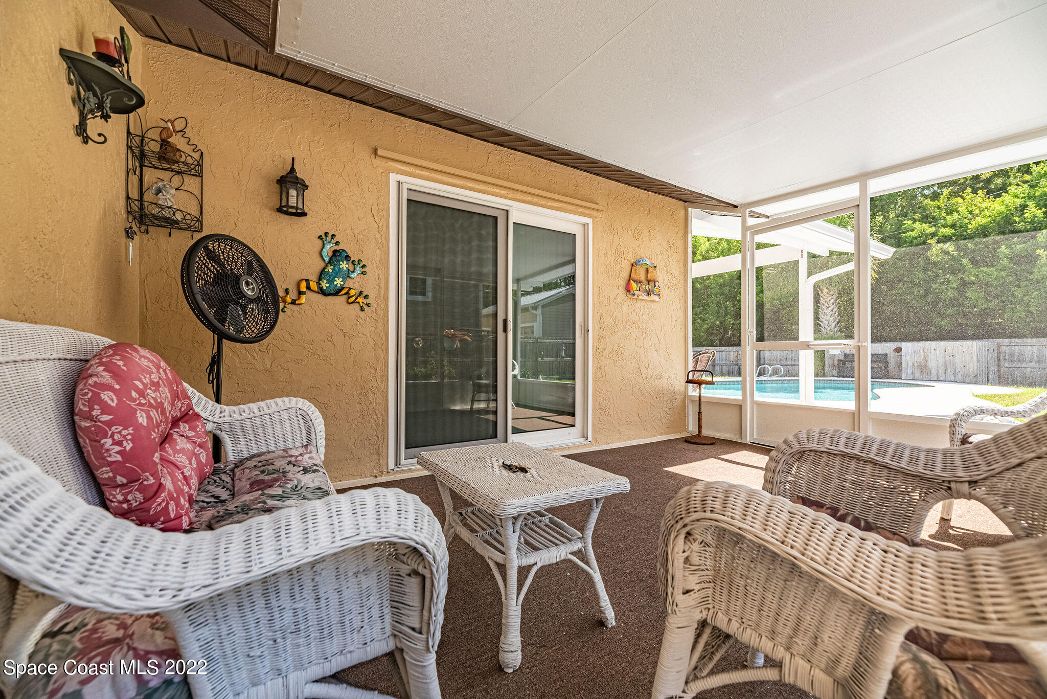 1821 Britt Road Cocoa, FL 32926 - Photo 41 of 63 a living room with furniture and a large window