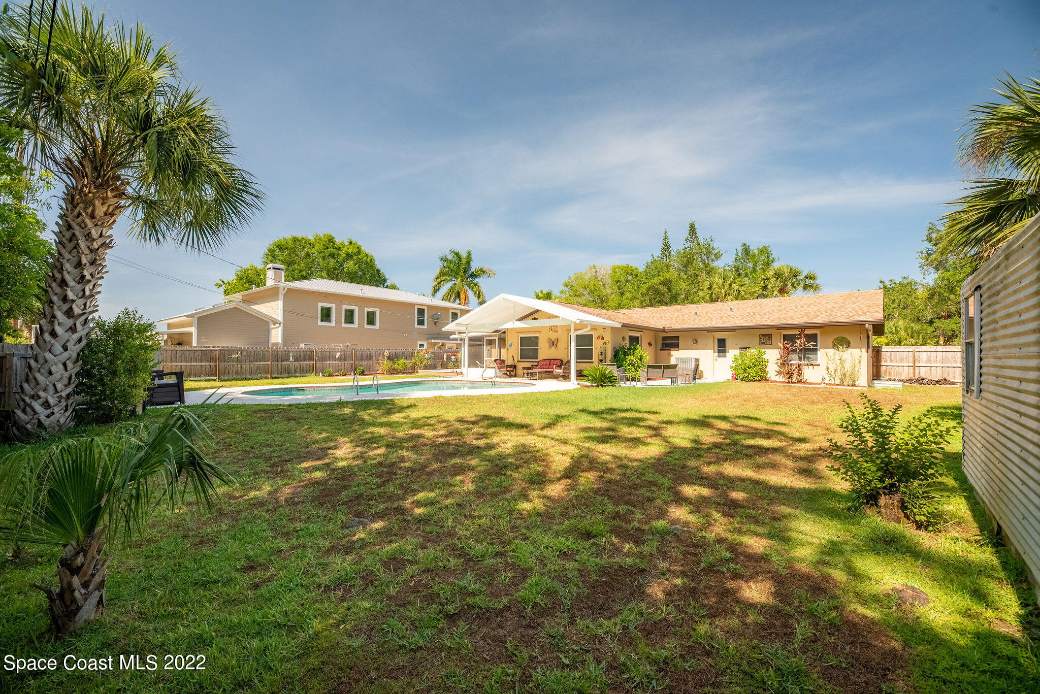 1821 Britt Road Cocoa, FL 32926 - Photo 42 of 63 a front view of a house with a big yard