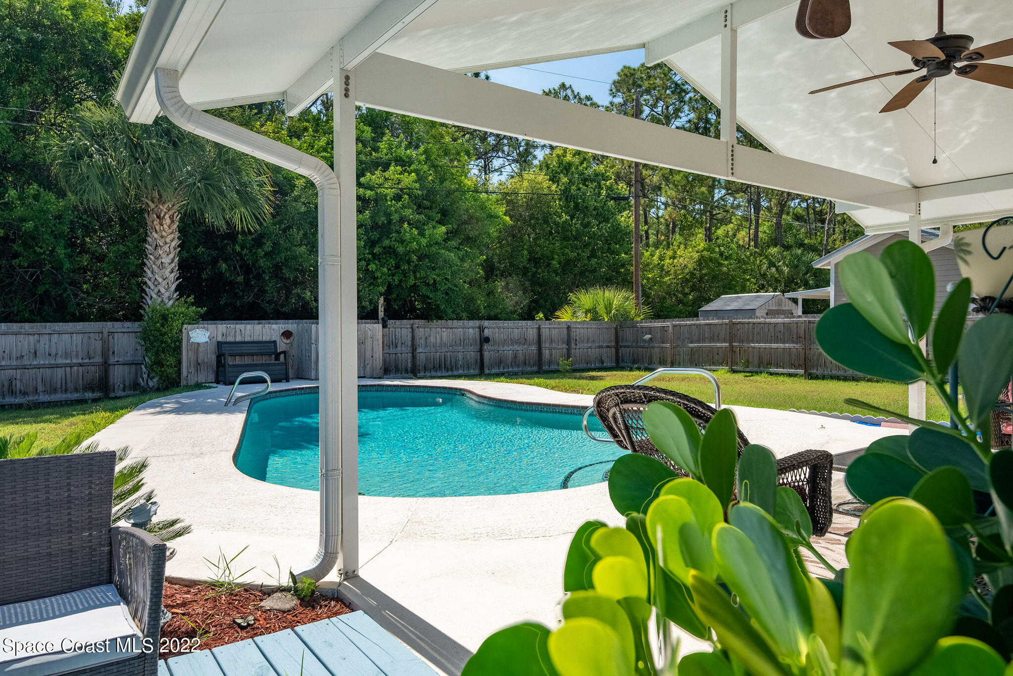 1821 Britt Road Cocoa, FL 32926 - Photo 44 of 63 a view of a swimming pool with a patio