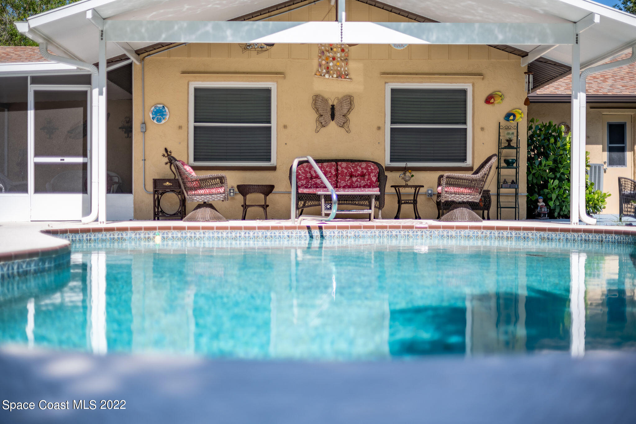 1821 Britt Road Cocoa, FL 32926 - Photo 47 of 63 a bathroom with mirror and sink