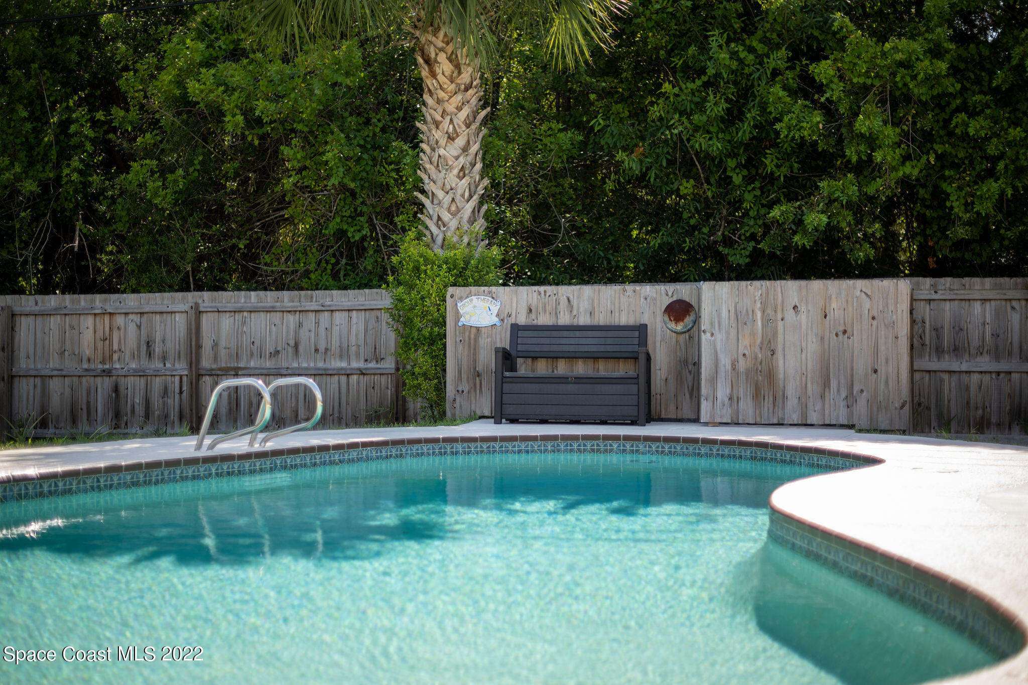 1821 Britt Road Cocoa, FL 32926 - Photo 51 of 63 a backyard of a house with table and chairs