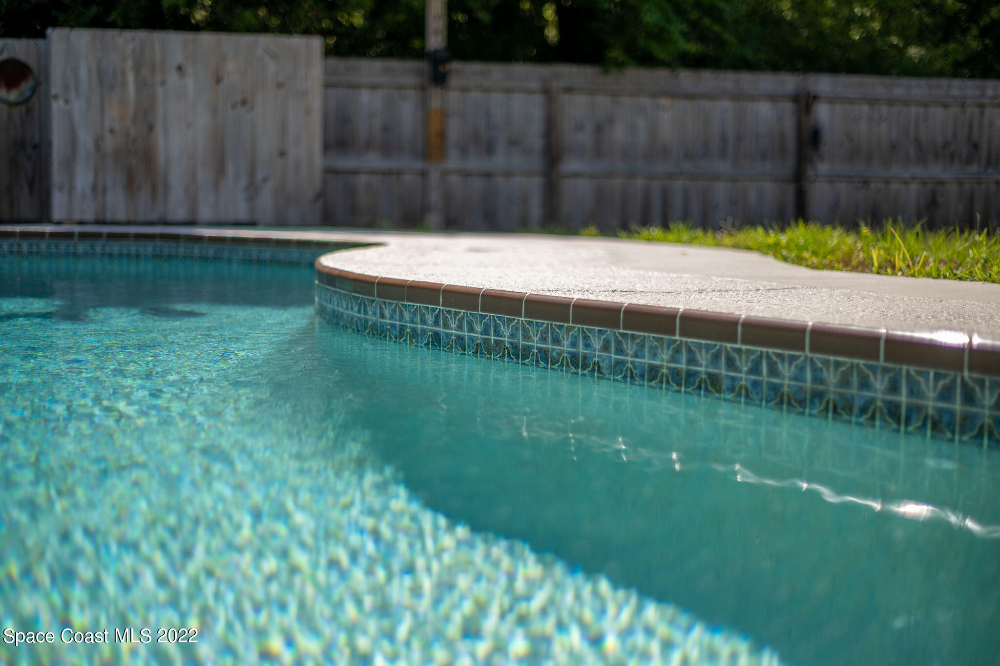 1821 Britt Road Cocoa, FL 32926 - Photo 52 of 63 a wooden fence with lake view