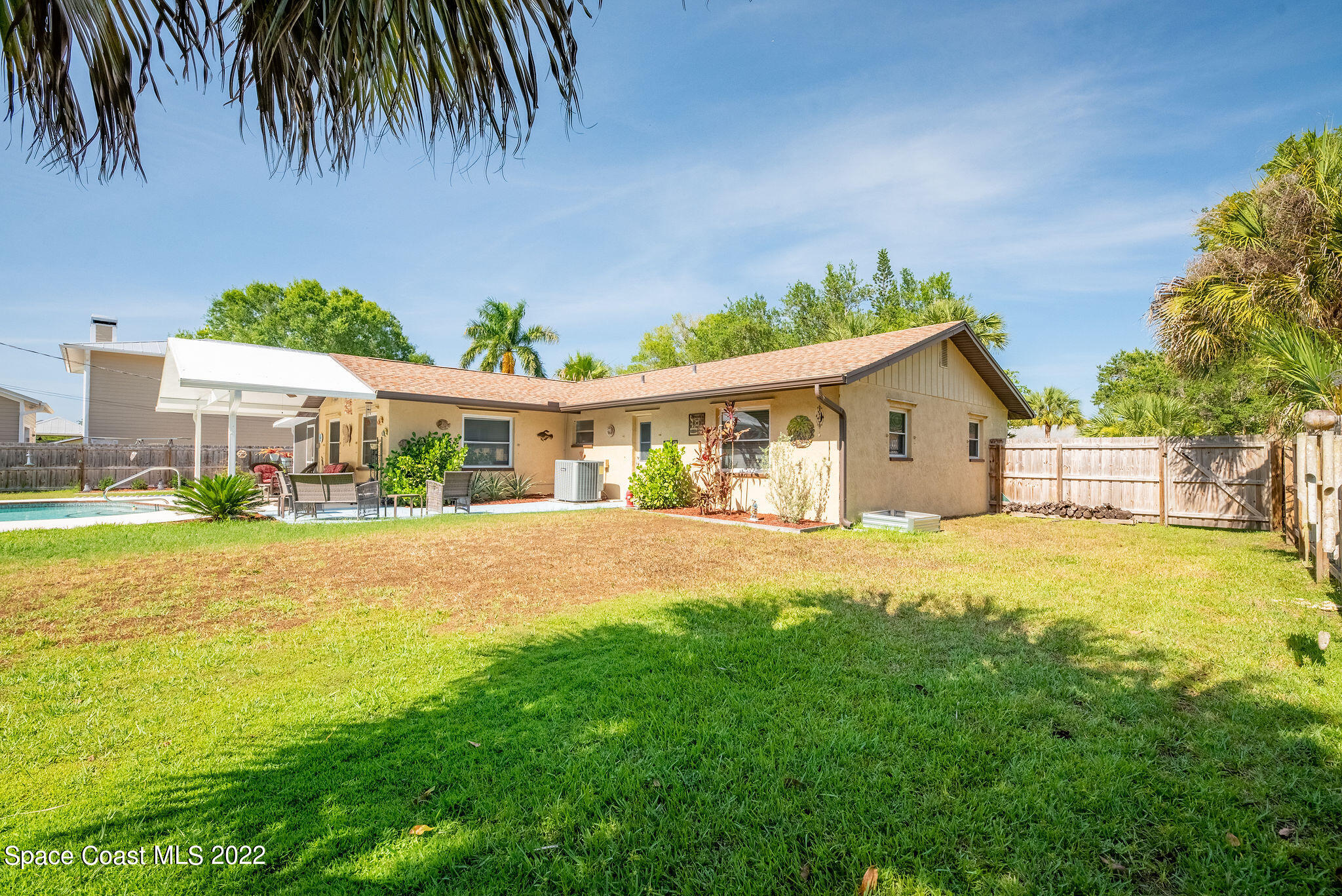 1821 Britt Road Cocoa, FL 32926 - Photo 57 of 63 a front view of house with yard and seating area