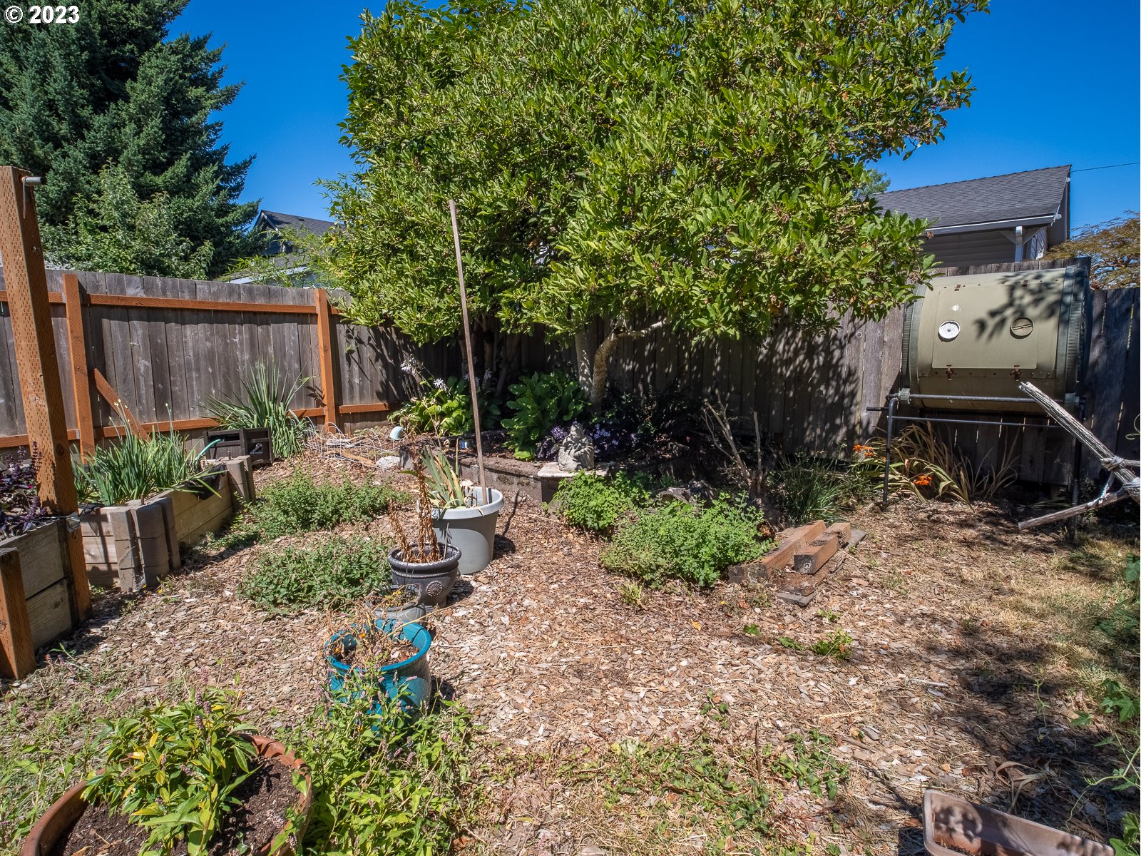 903 North Winchell Street Portland, OR 97217 - Photo 32 of 34 a view of a chair and table in backyard
