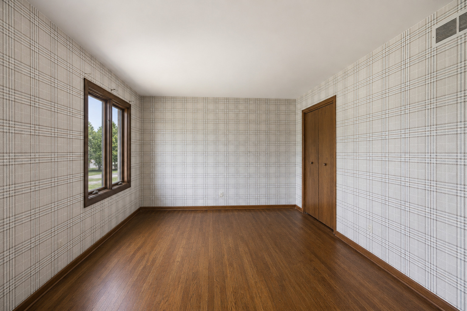 6723 Kingswood Road Willowbrook, IL 60527 - Photo 31 of 51 a view of an empty room with wooden floor and a window