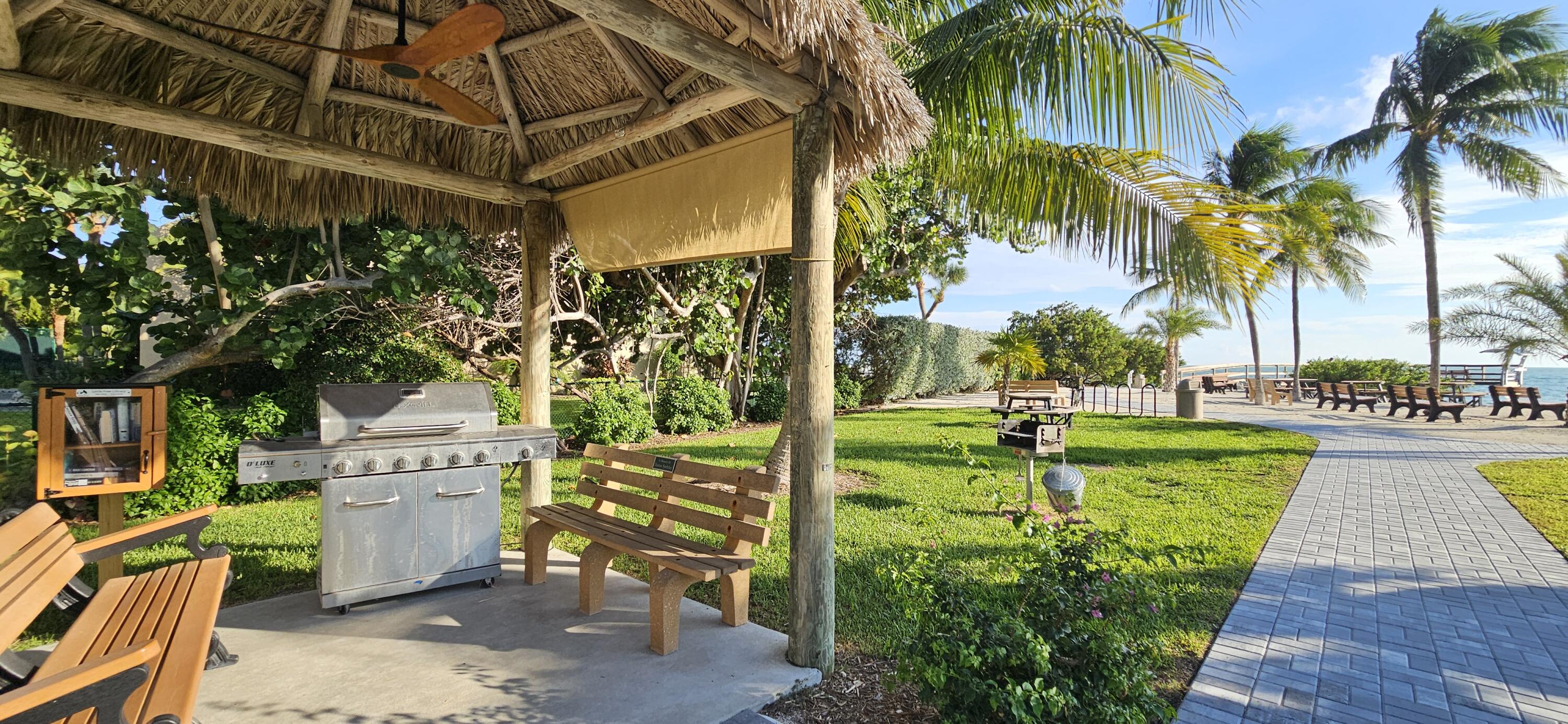 133 8th Street Key Colony Beach, FL 33051 - Photo 42 of 50 Grilling area & mini library