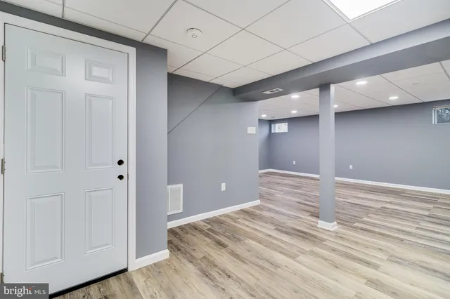 a view of a livingroom with wooden floor