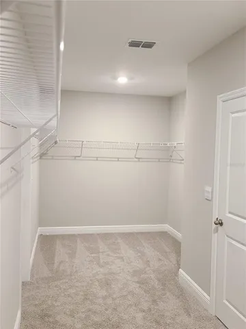 a room with a sink and a toilet