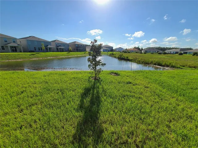 a view of a lake with a mountain in the background