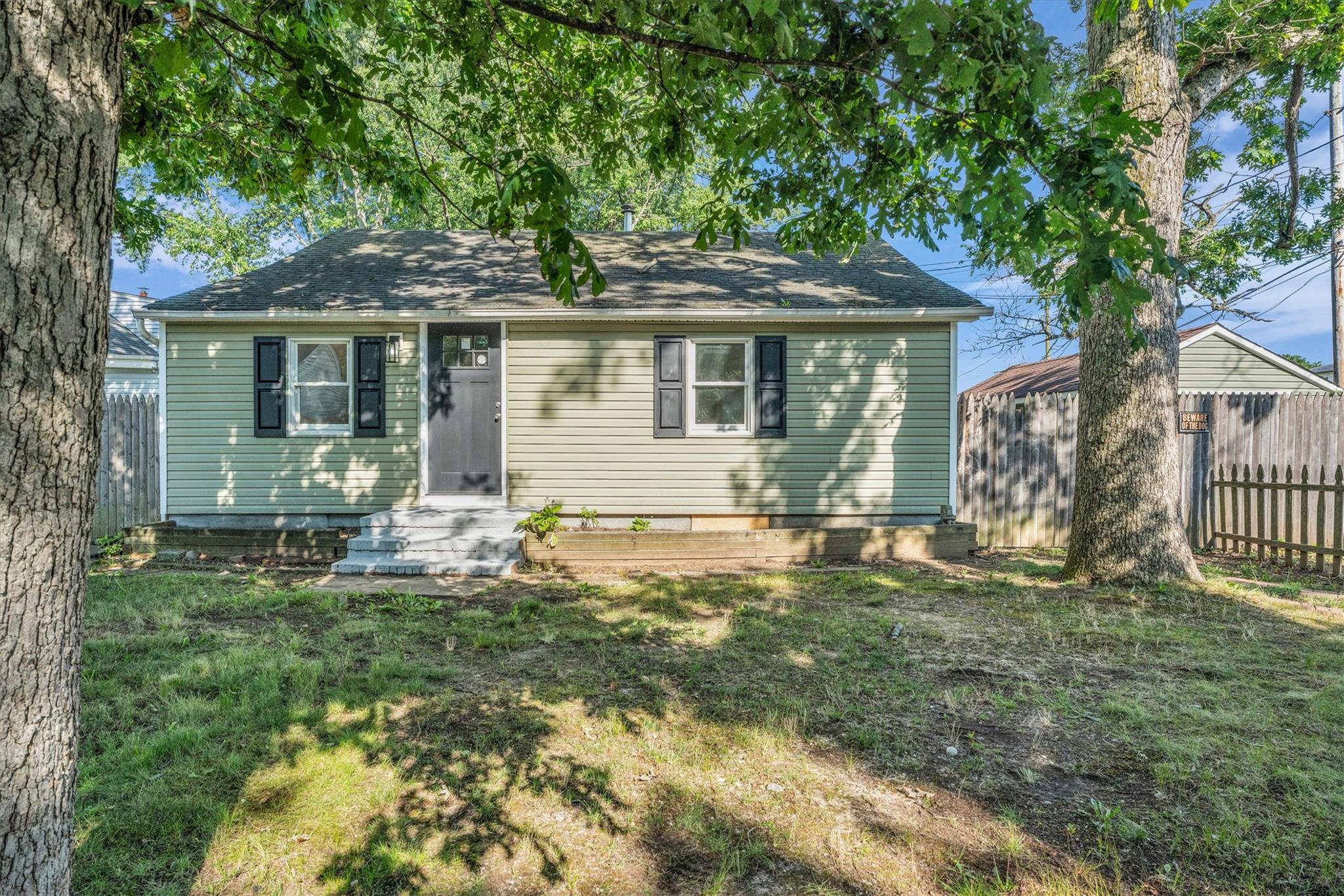 69 Commack Road North Babylon, NY 11703 - Photo 1 of 1 View of front of property with roof with shingles