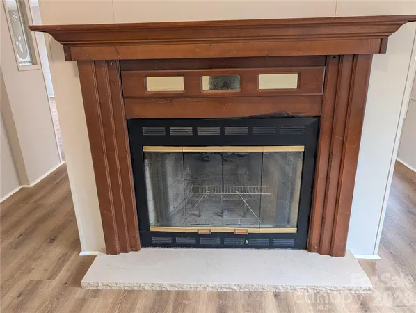 a view of fireplace and door