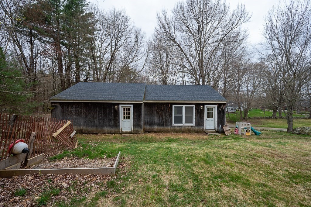 47 Lake Road Brookfield, MA 01506 - Photo 23 of 29 a view of a house with backyard and a tree