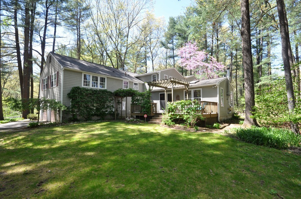 12 Rambling Road Sudbury, MA 01776 - Photo 1 of 26 a front view of a house with a garden