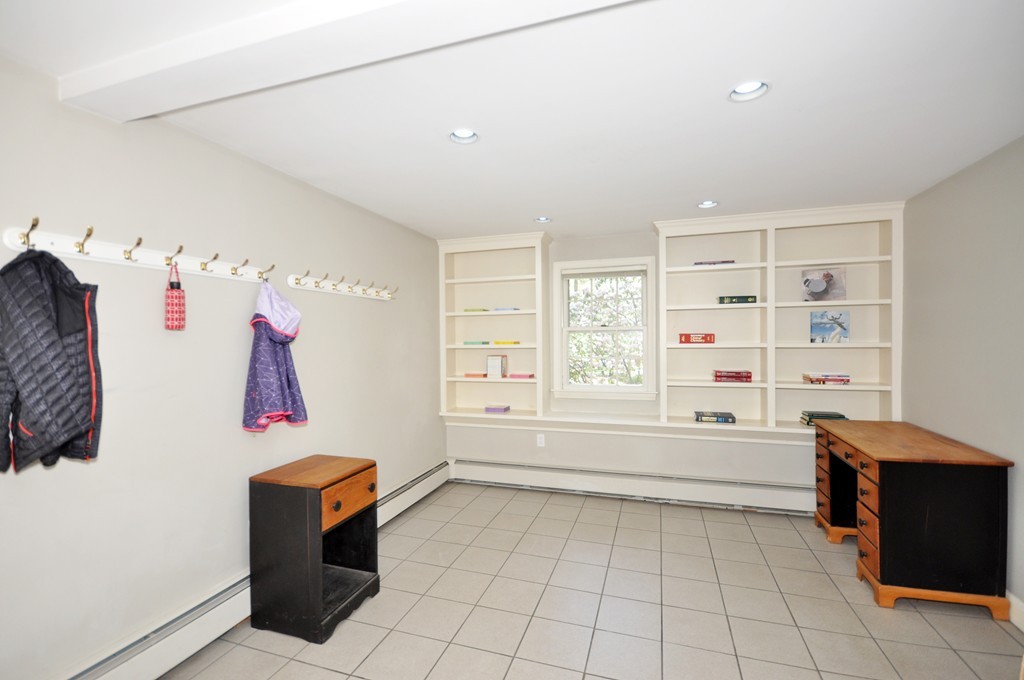 12 Rambling Road Sudbury, MA 01776 - Photo 22 of 26 a room with furniture and window
