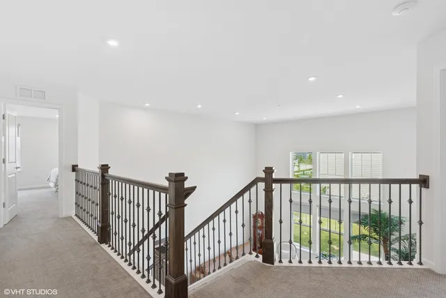 a view of a hallway with workspace