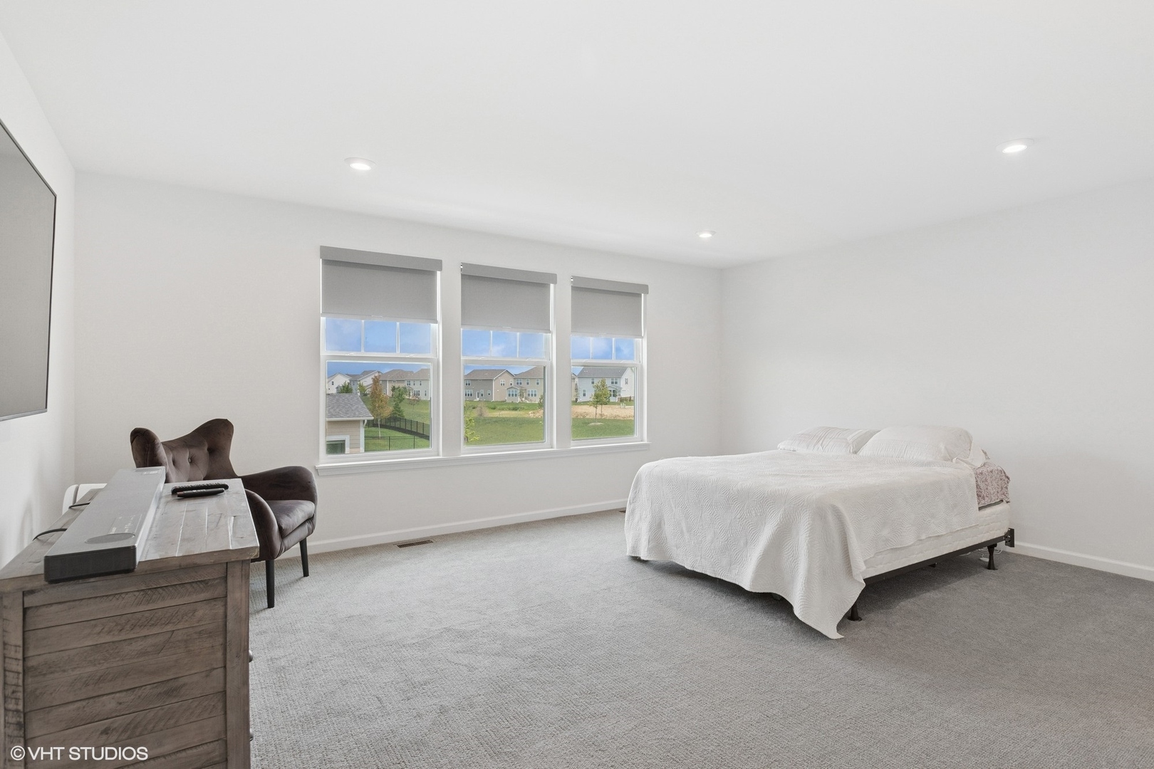 12906 South Sydney Circle Plainfield, IL 60585 - Photo 13 of 31 a living room with furniture and a large window