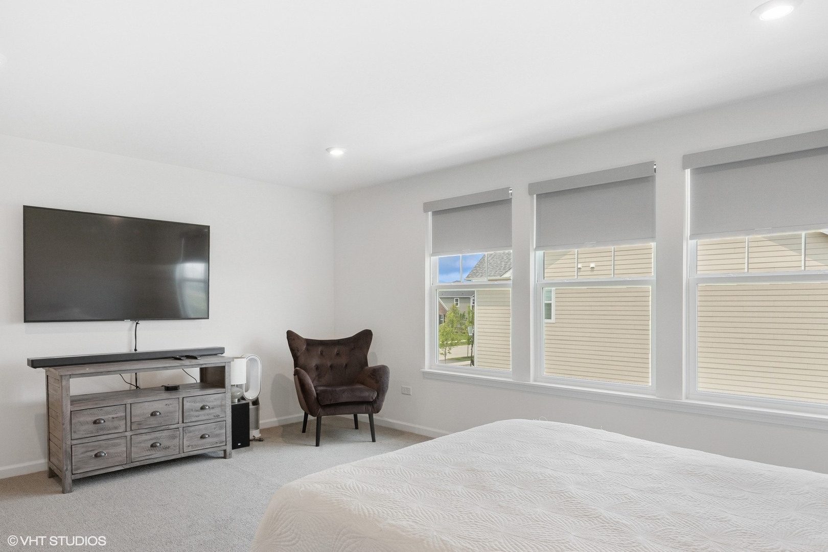 12906 South Sydney Circle Plainfield, IL 60585 - Photo 14 of 31 a bedroom with furniture and a flat screen tv