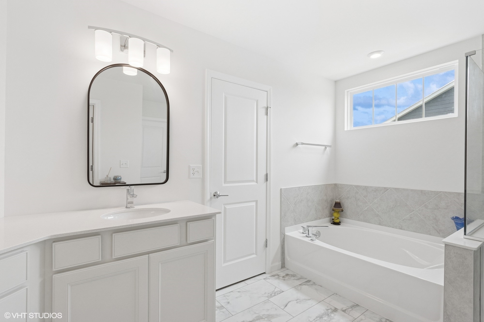12906 South Sydney Circle Plainfield, IL 60585 - Photo 16 of 31 a bathroom with a sink and a mirror