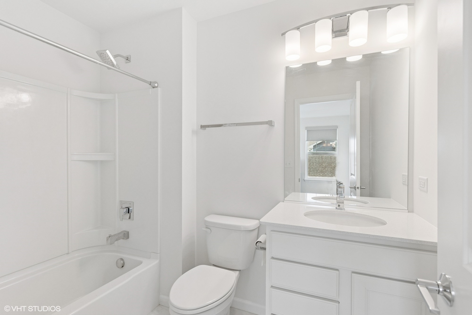 12906 South Sydney Circle Plainfield, IL 60585 - Photo 22 of 31 a bathroom with a sink a toilet and shower