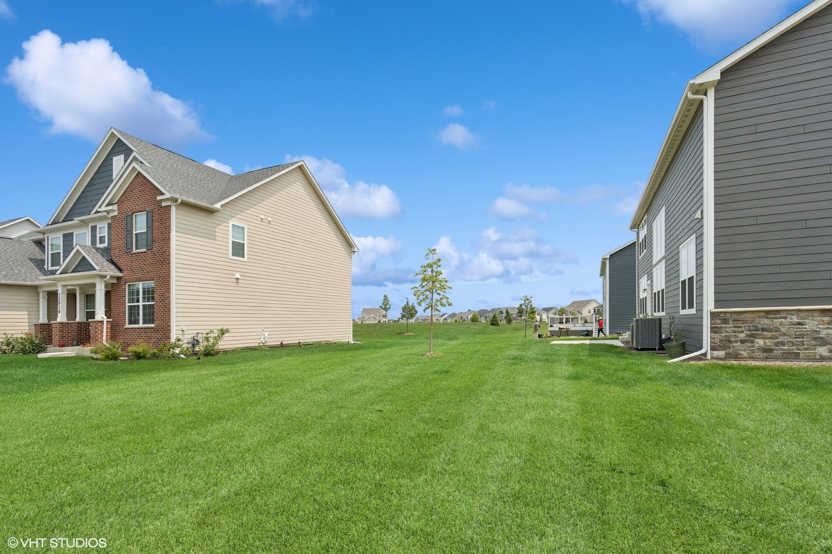 12906 South Sydney Circle Plainfield, IL 60585 - Photo 26 of 31 a view of a house with a big yard