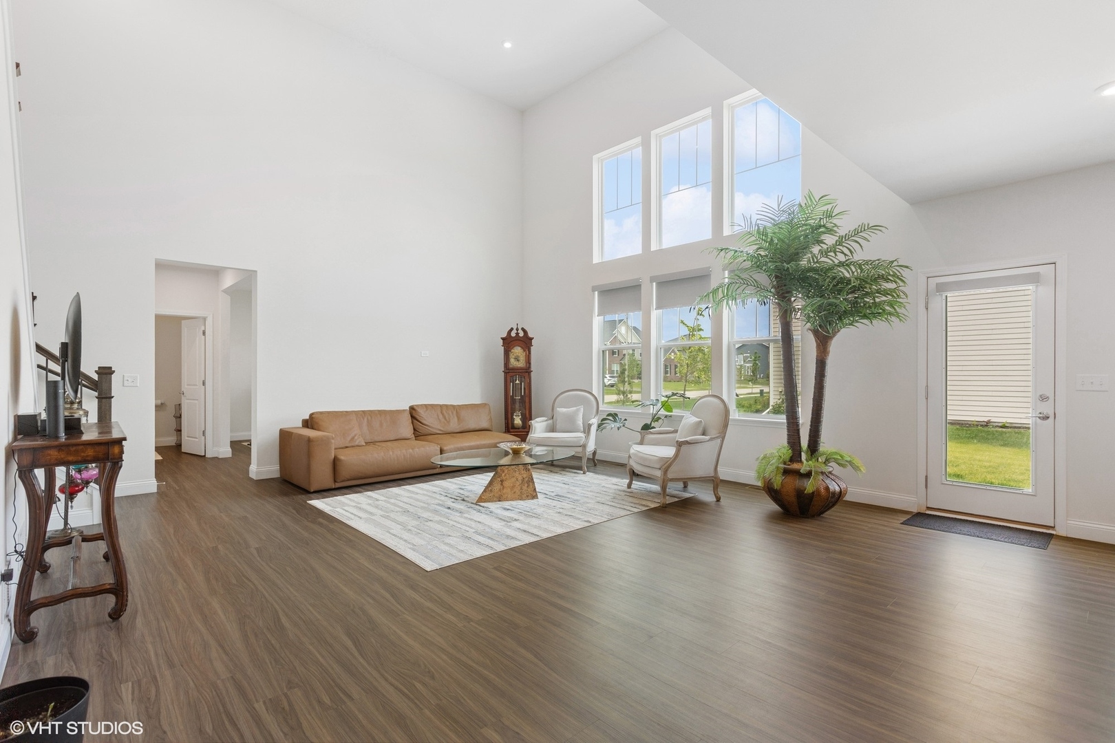 12906 South Sydney Circle Plainfield, IL 60585 - Photo 6 of 31 a living room with furniture and a large window