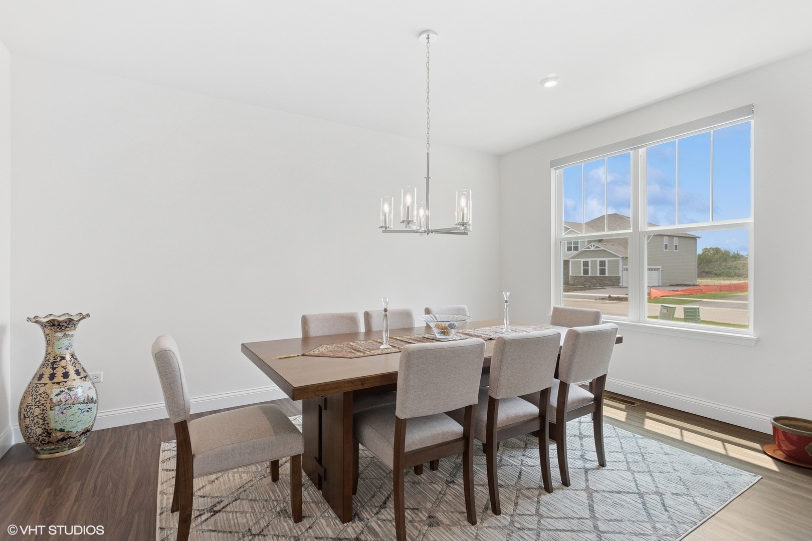 12906 South Sydney Circle Plainfield, IL 60585 - Photo 10 of 31 a view of a dining room with furniture window and wooden floor