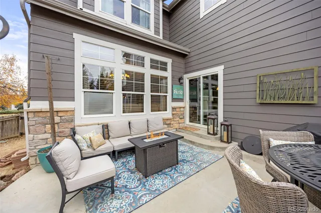 a building outdoor space with patio furniture