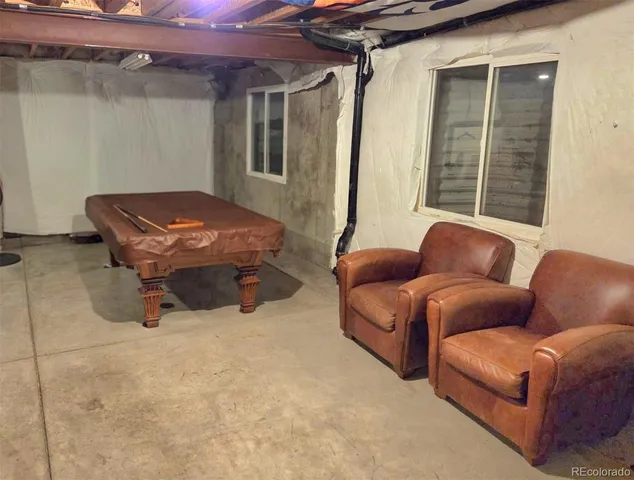 a outdoor living space with furniture and a window
