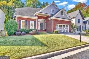 3324 Rose Ridge Atlanta, GA 30340 - Photo 1 of 1 a front view of a house with garden