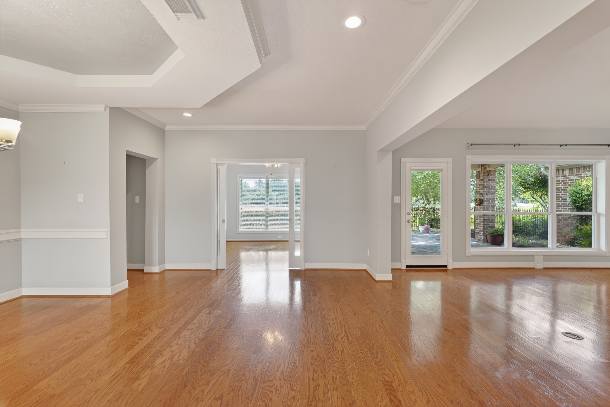 20714 Flora View Court Spring, TX 77379 - Photo 7 of 40 a view of empty room with wooden floor and fan