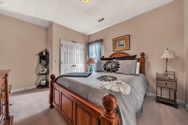 a room with furniture pool table and windows