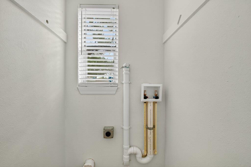 125 Menendez Road St. Augustine, FL 32080 - Photo 5 of 41 a bathroom with a shower and a window