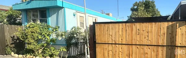 a yellow house with outdoor space