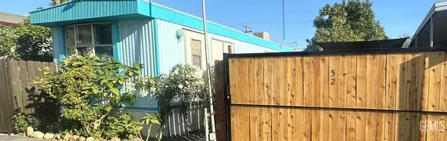 a yellow house with outdoor space