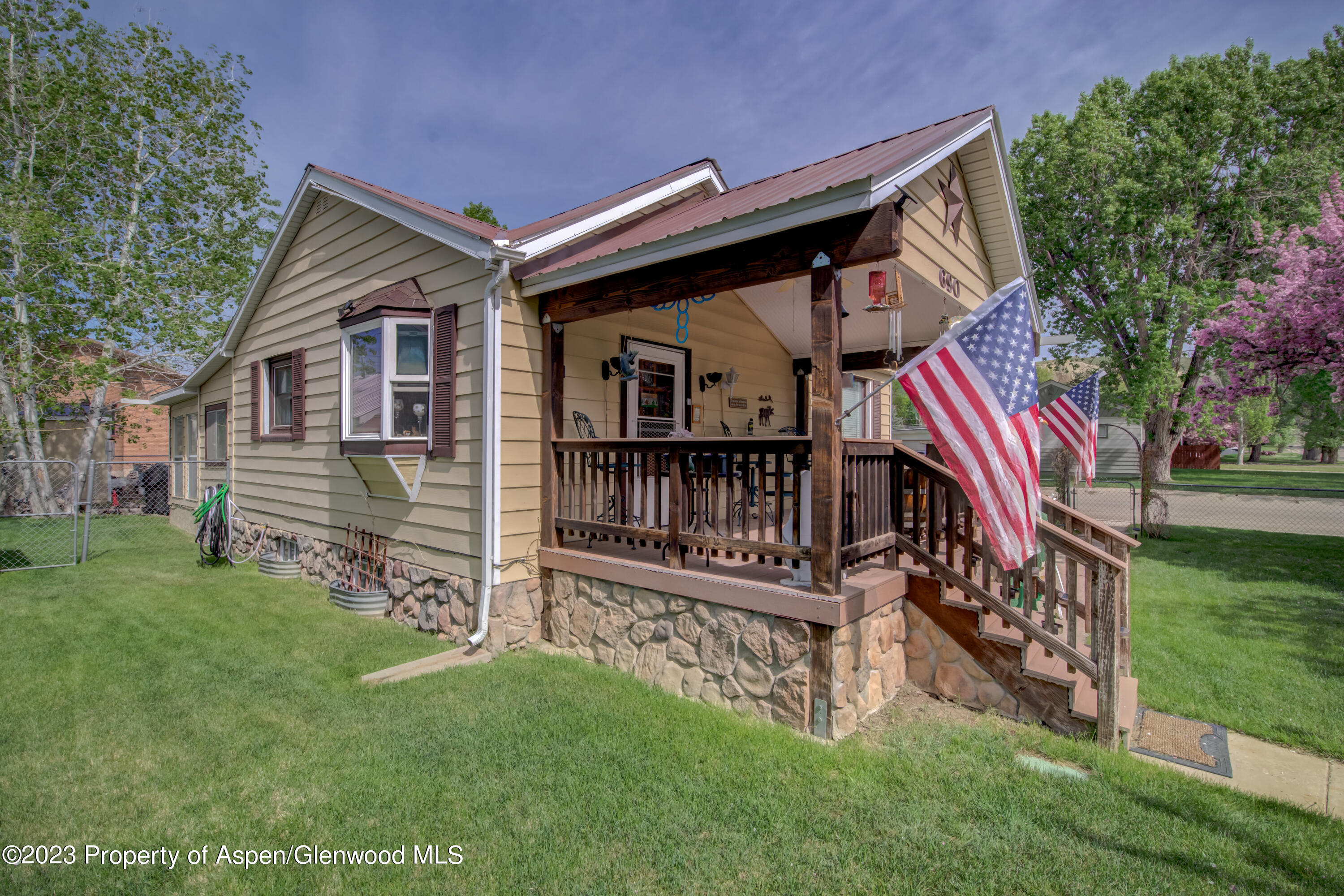 690 Pershing Street Craig, CO 81625 - Photo 14 of 72 a view of front of a house with a yard