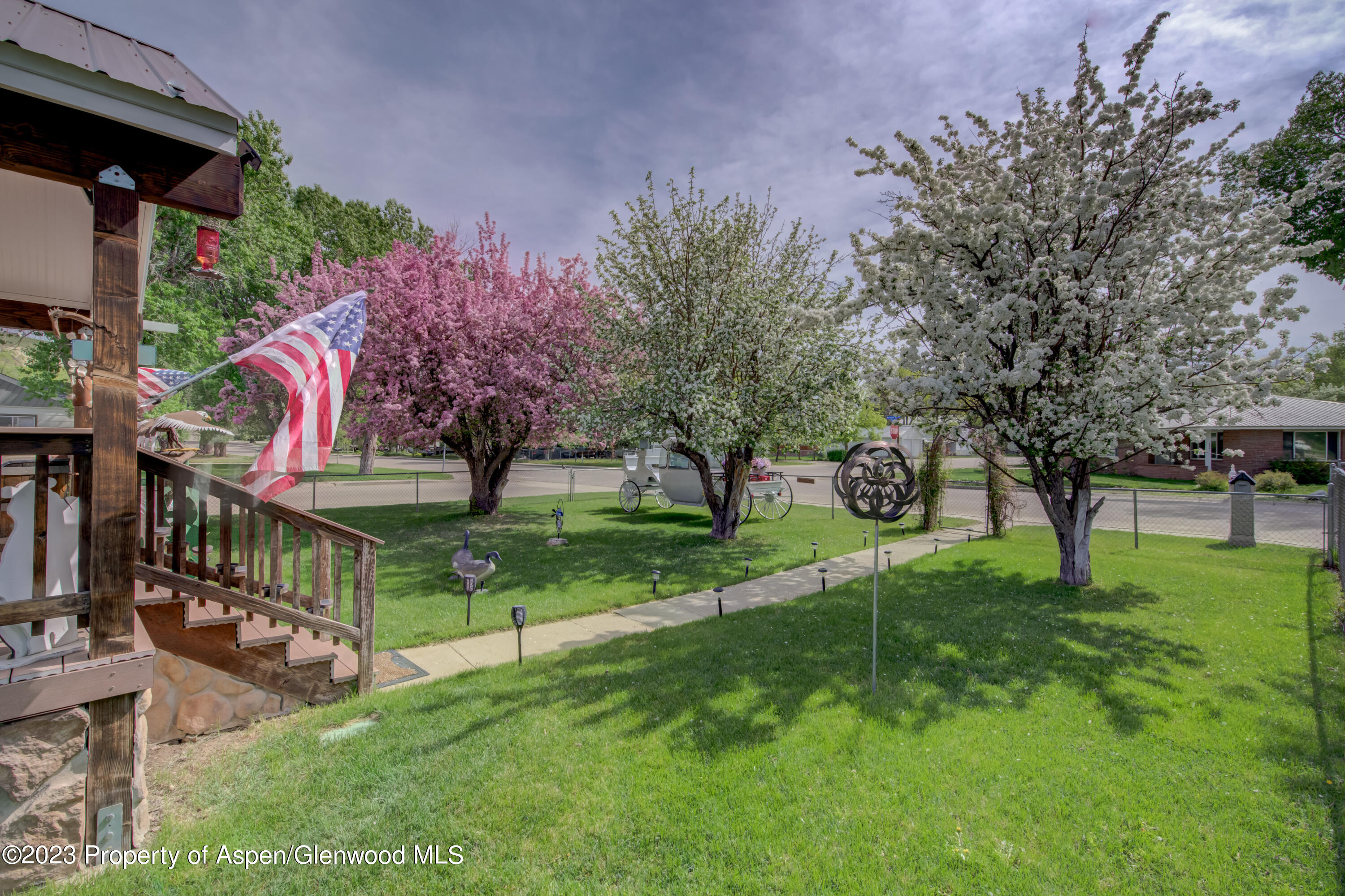 690 Pershing Street Craig, CO 81625 - Photo 15 of 72 a view of a house with a yard