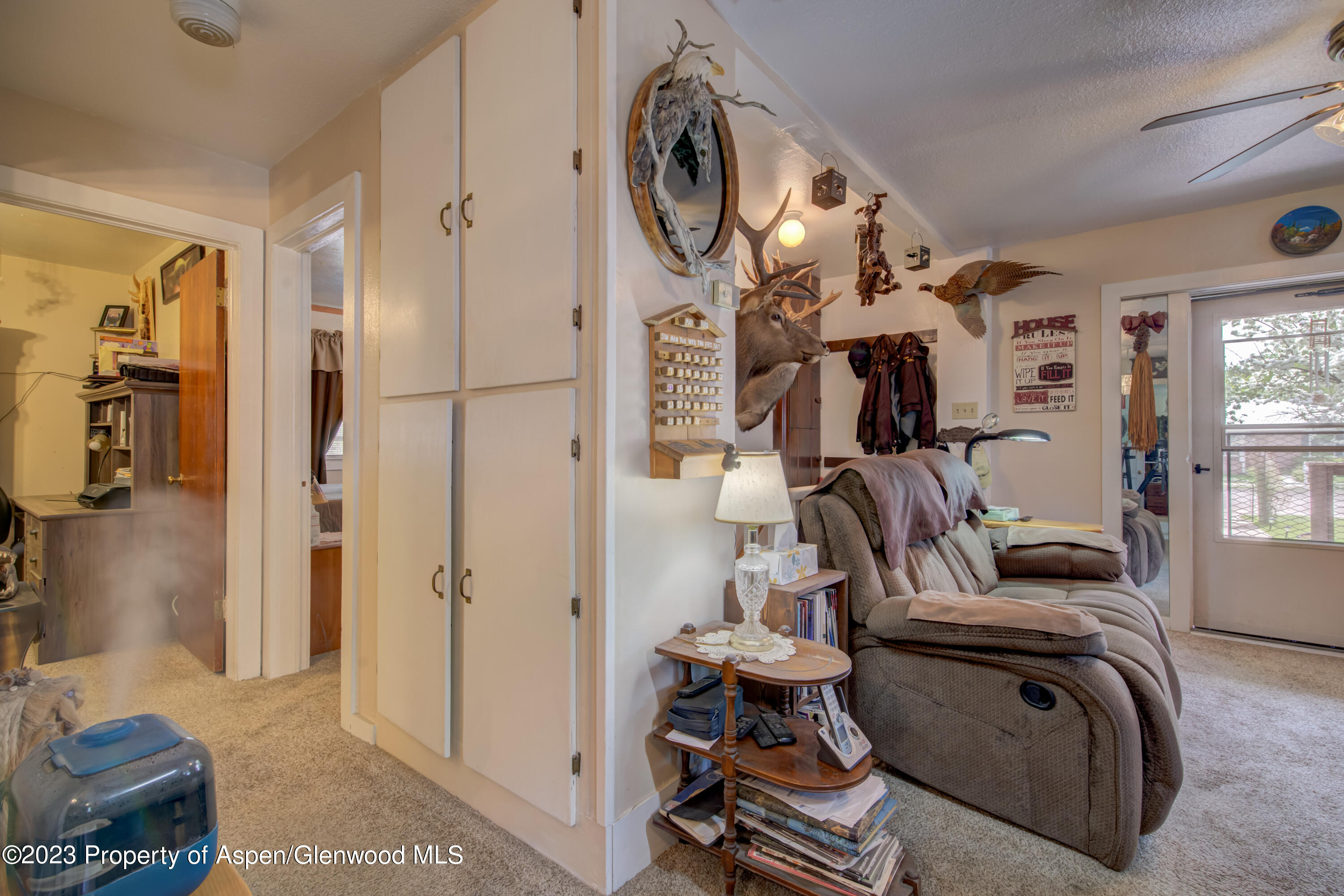 690 Pershing Street Craig, CO 81625 - Photo 36 of 72 a view of walk in closet with clothes and shoes