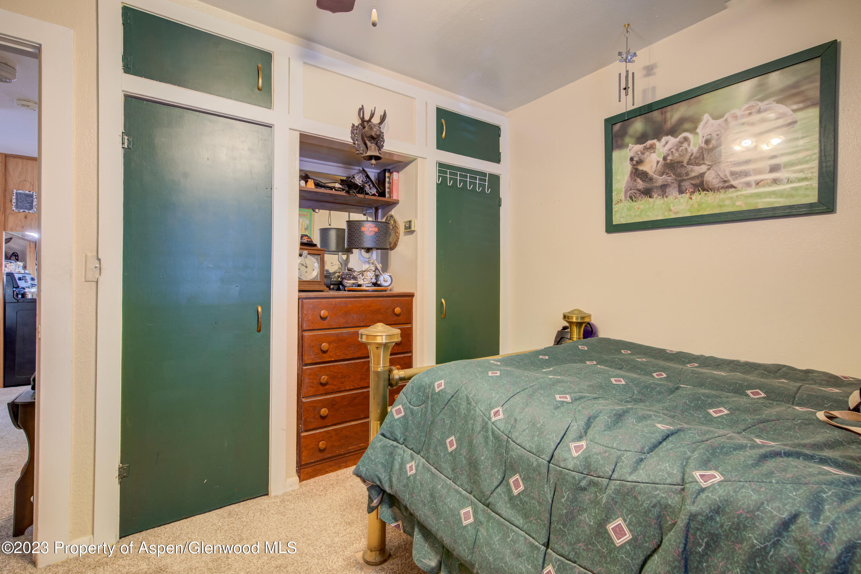690 Pershing Street Craig, CO 81625 - Photo 44 of 72 a bedroom with a bed and closet