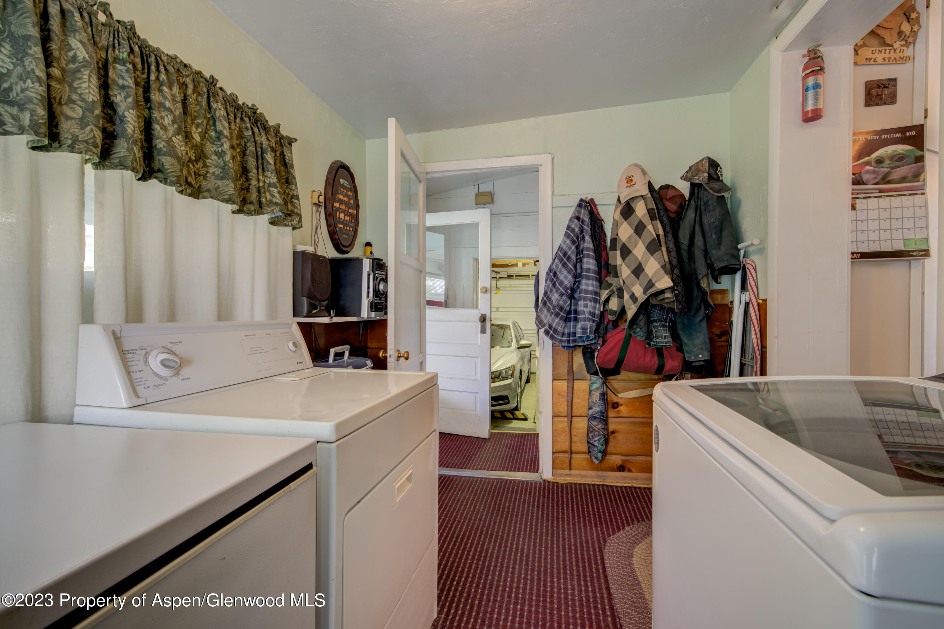 690 Pershing Street Craig, CO 81625 - Photo 49 of 72 a view of walk in closet with clothes and shoes
