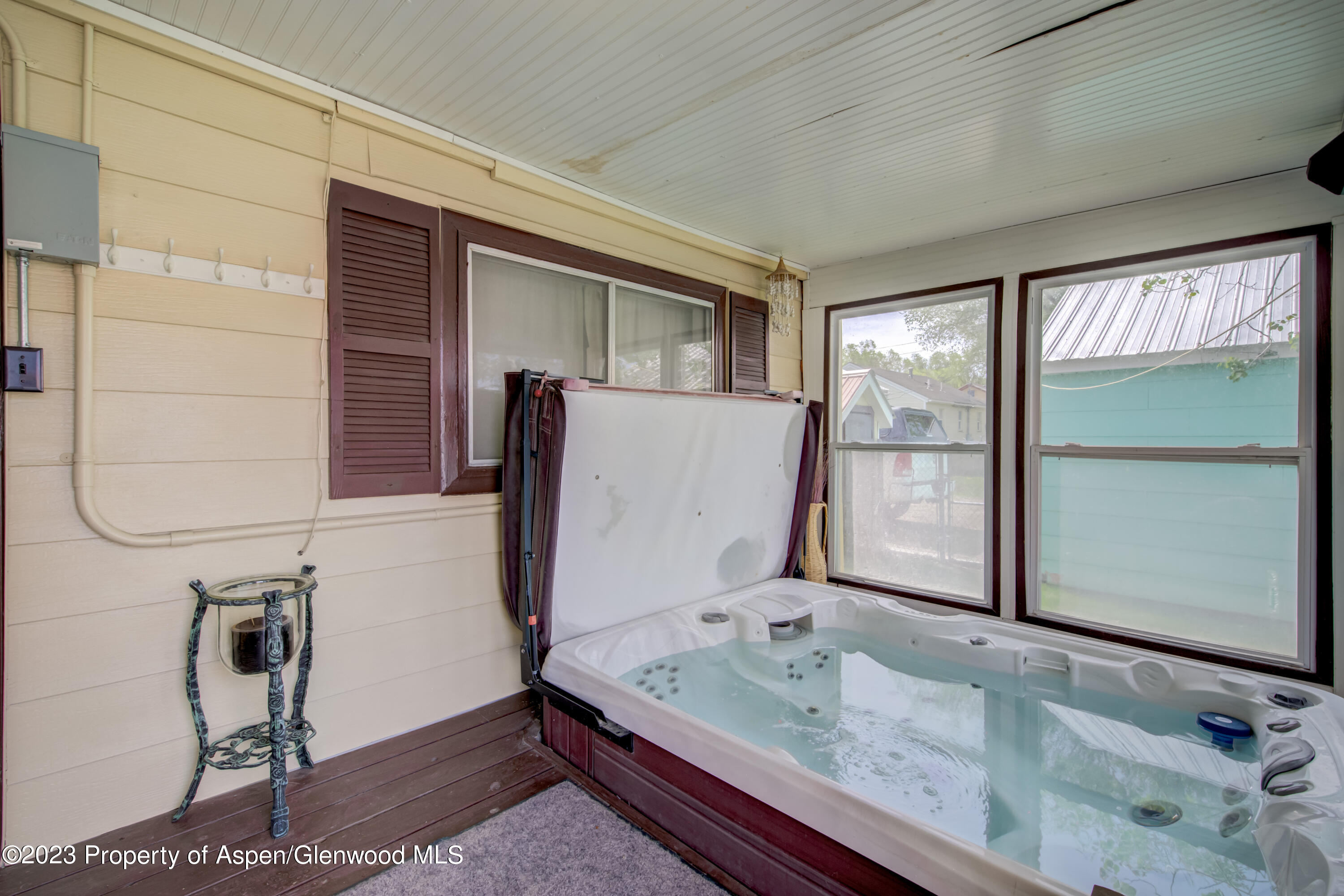 690 Pershing Street Craig, CO 81625 - Photo 51 of 72 a bathroom with a granite countertop sink and a mirror