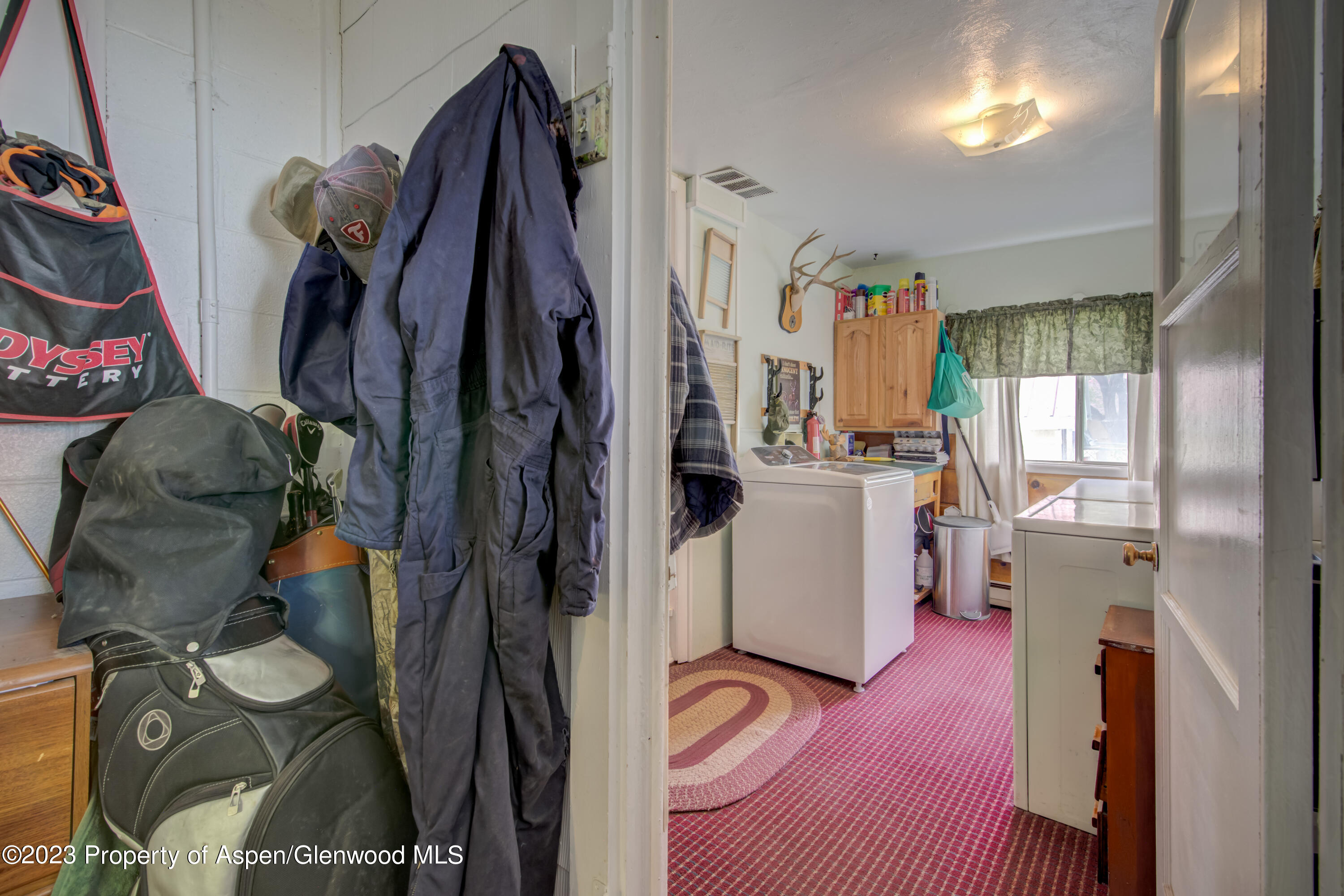 690 Pershing Street Craig, CO 81625 - Photo 57 of 72 a view of walk in closet with clothes and shoes