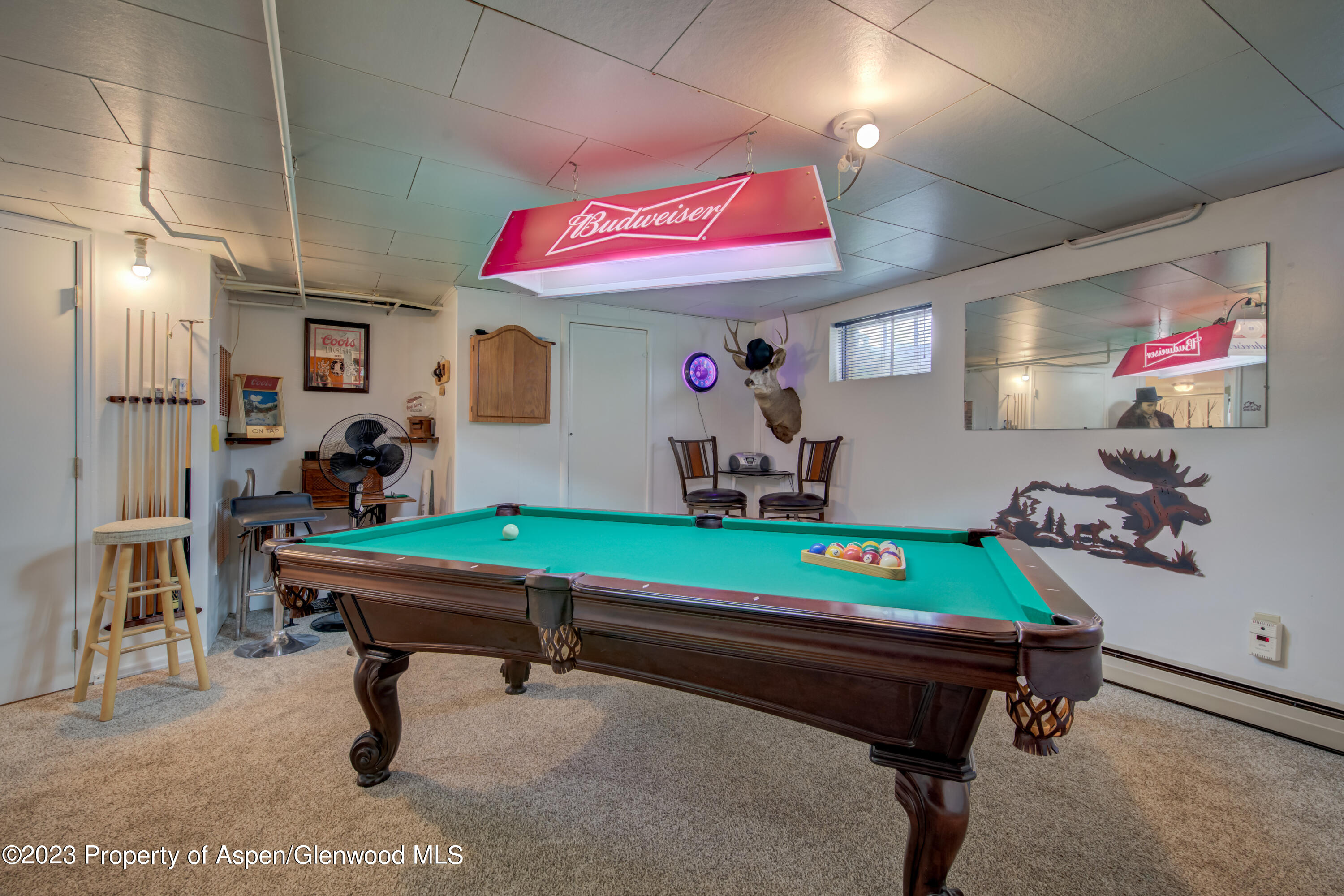 690 Pershing Street Craig, CO 81625 - Photo 65 of 72 a room with musical instruments and air hockey table