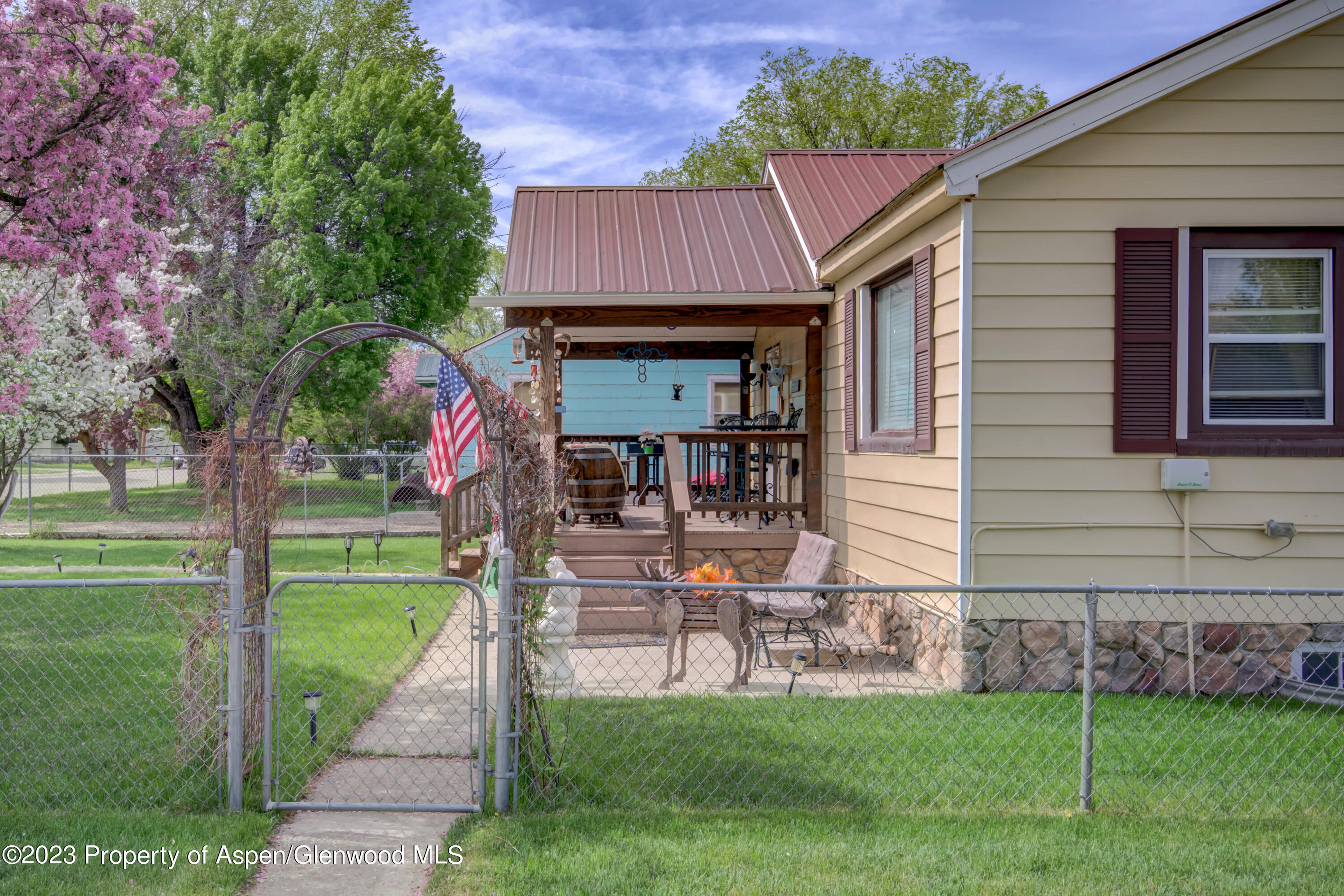 690 Pershing Street Craig, CO 81625 - Photo 7 of 72 a front view of house with yard and outdoor seating
