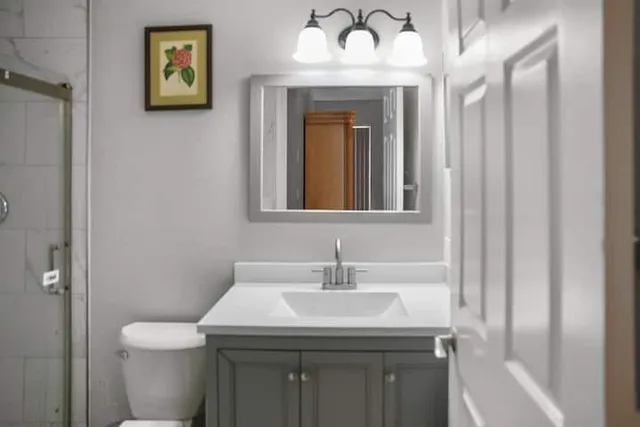 a bathroom with a sink and a toilet