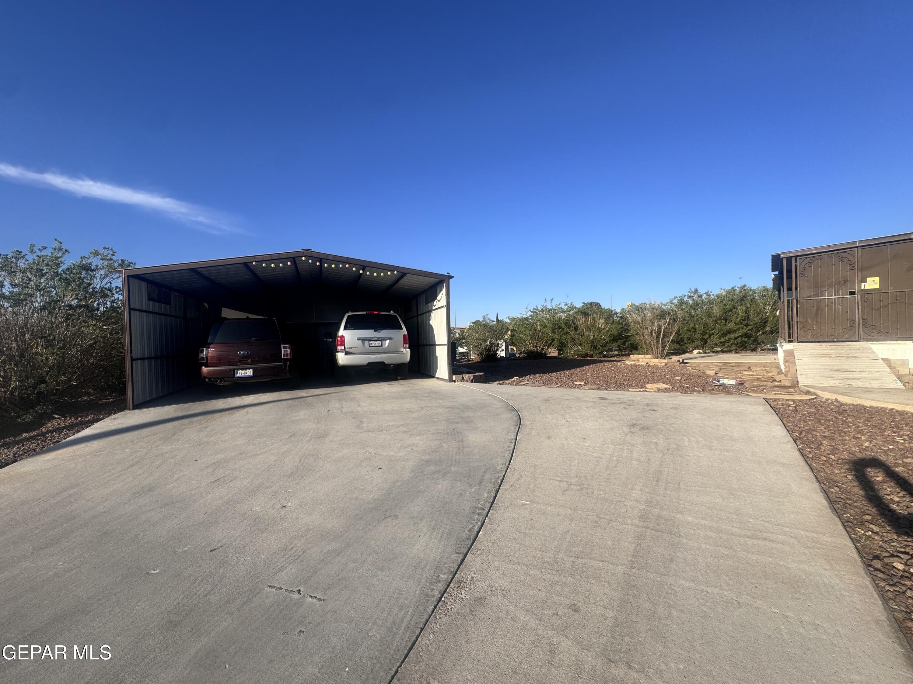 12400 Rojas Drive El Paso, TX 79928 - Photo 7 of 11 a view of a car park both side of building