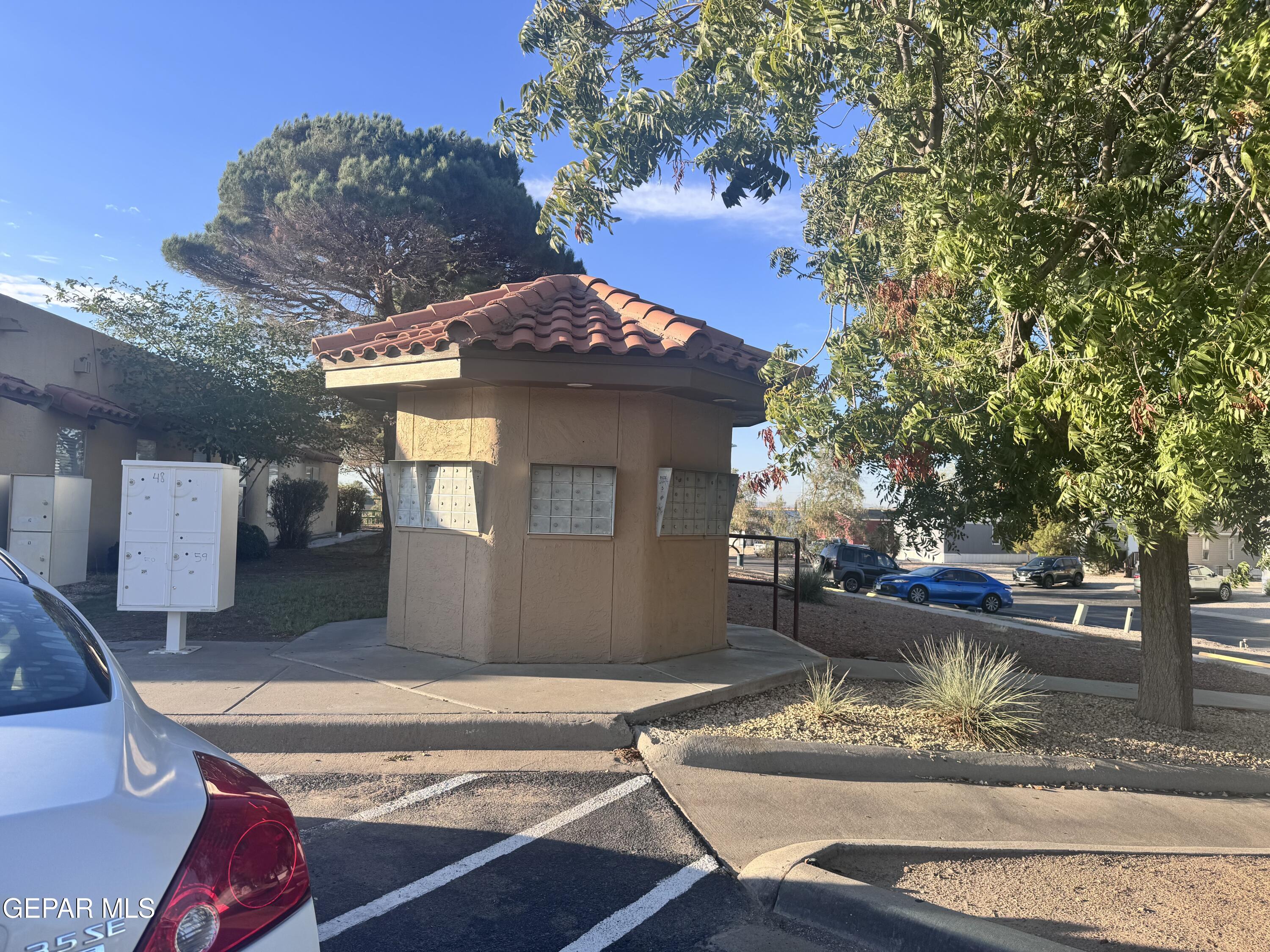 12400 Rojas Drive El Paso, TX 79928 - Photo 8 of 11 a view of a house with a yard