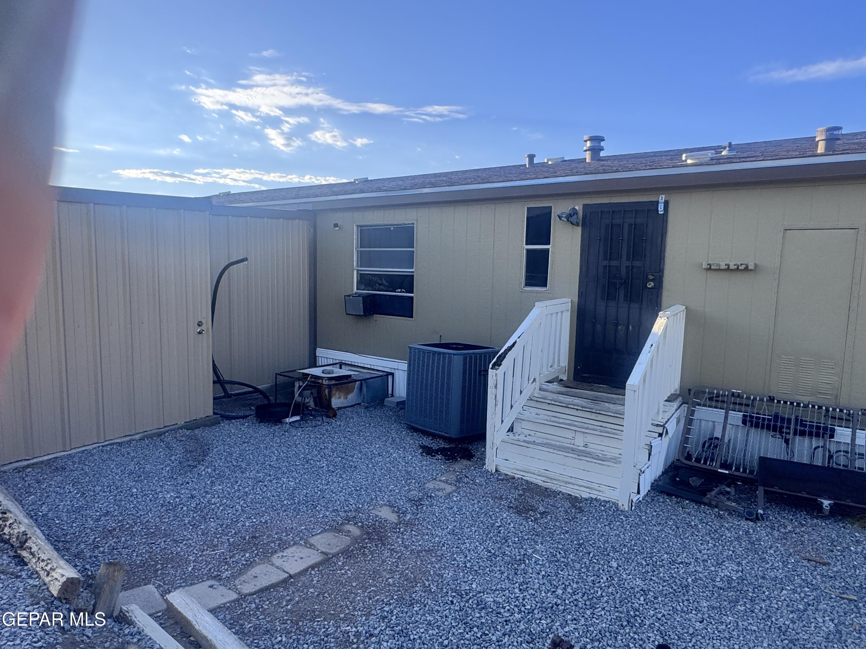12400 Rojas Drive El Paso, TX 79928 - Photo 9 of 11 a view of kitchen with furniture and a chandelier