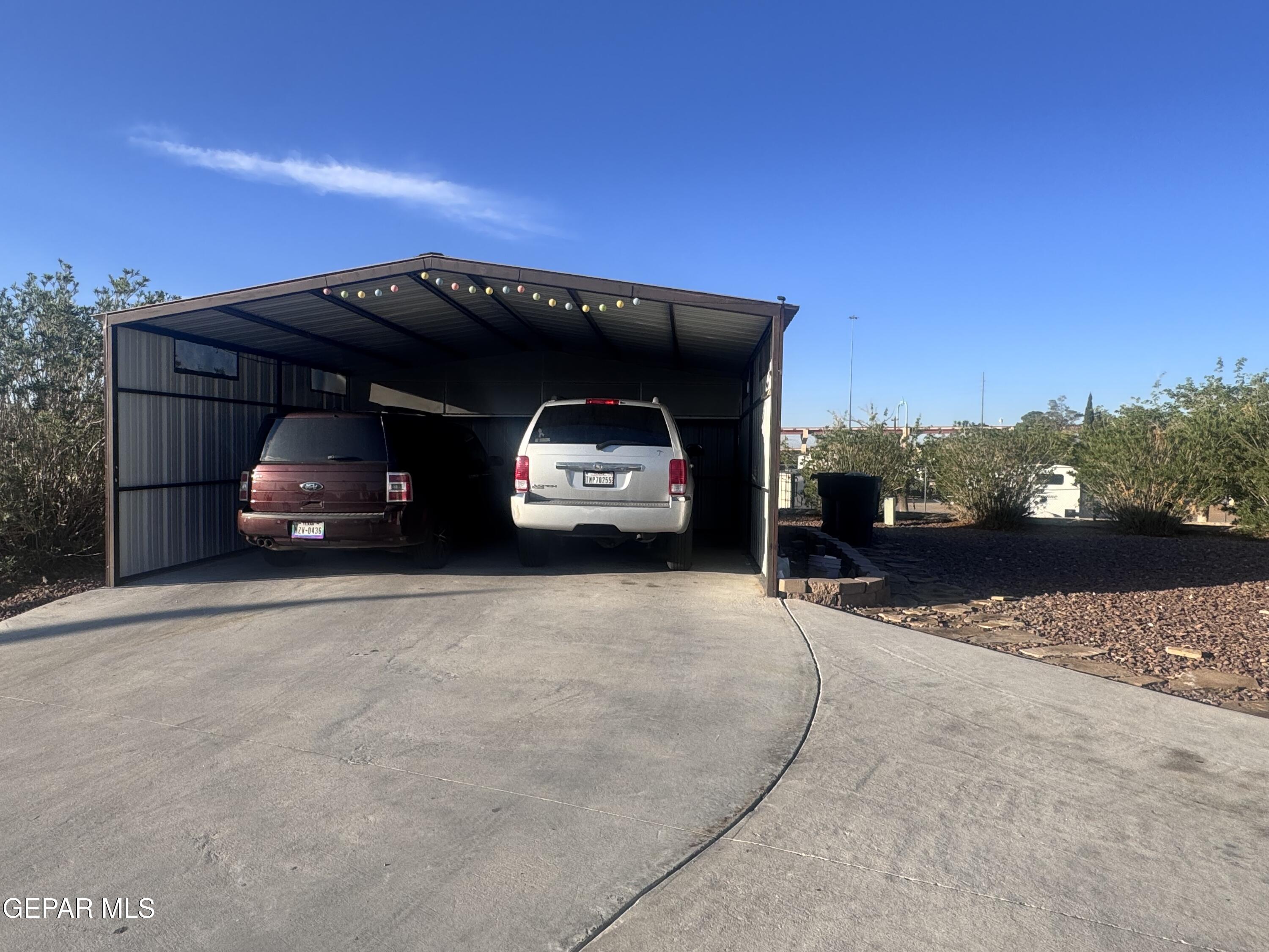 12400 Rojas Drive El Paso, TX 79928 - Photo 10 of 11 a view of a car garage