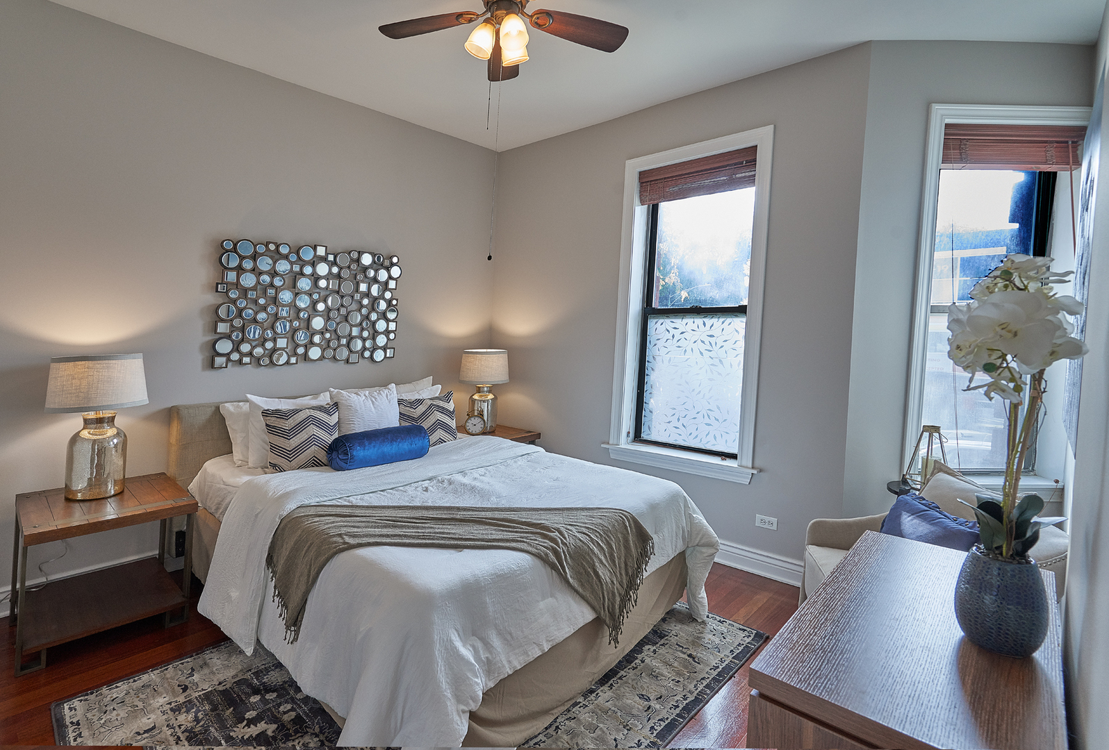 2801 North Seminary Avenue, Unit 1S Chicago, IL 60657 - Photo 12 of 21 a bedroom with bed and a chandelier